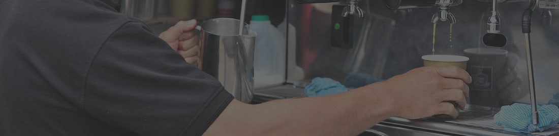 A Flying Bean Café coffee van serving at an outdoor event